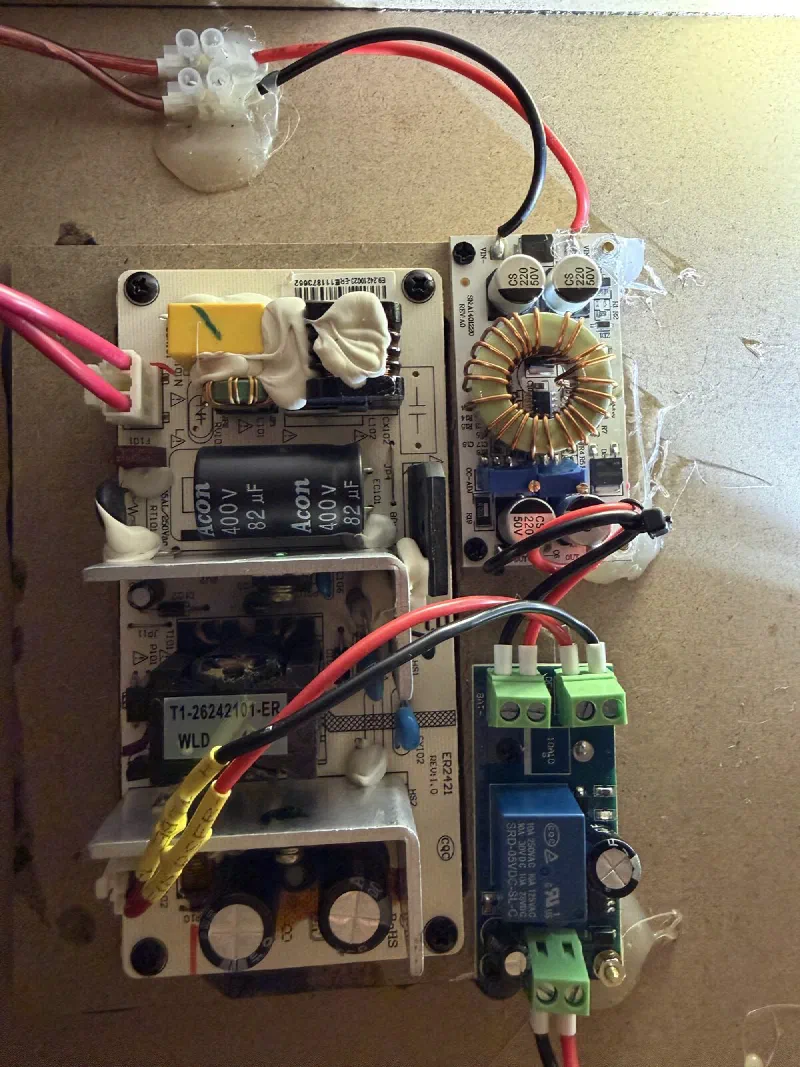 Original PSU (left), boost converter (top right), YX850 (bottom right)